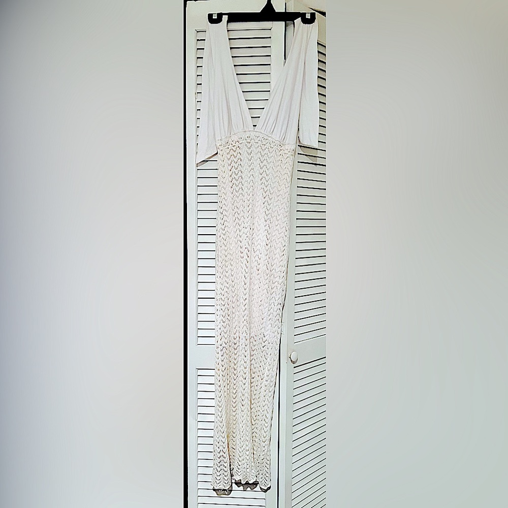 Long white body-con halter dress with cotton/poly stretch material and belt